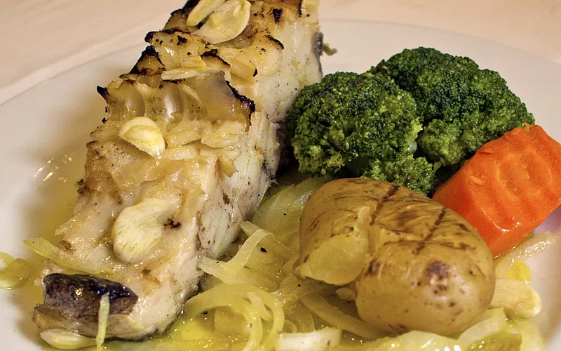 Bacalhau assado, a especialidade da casa